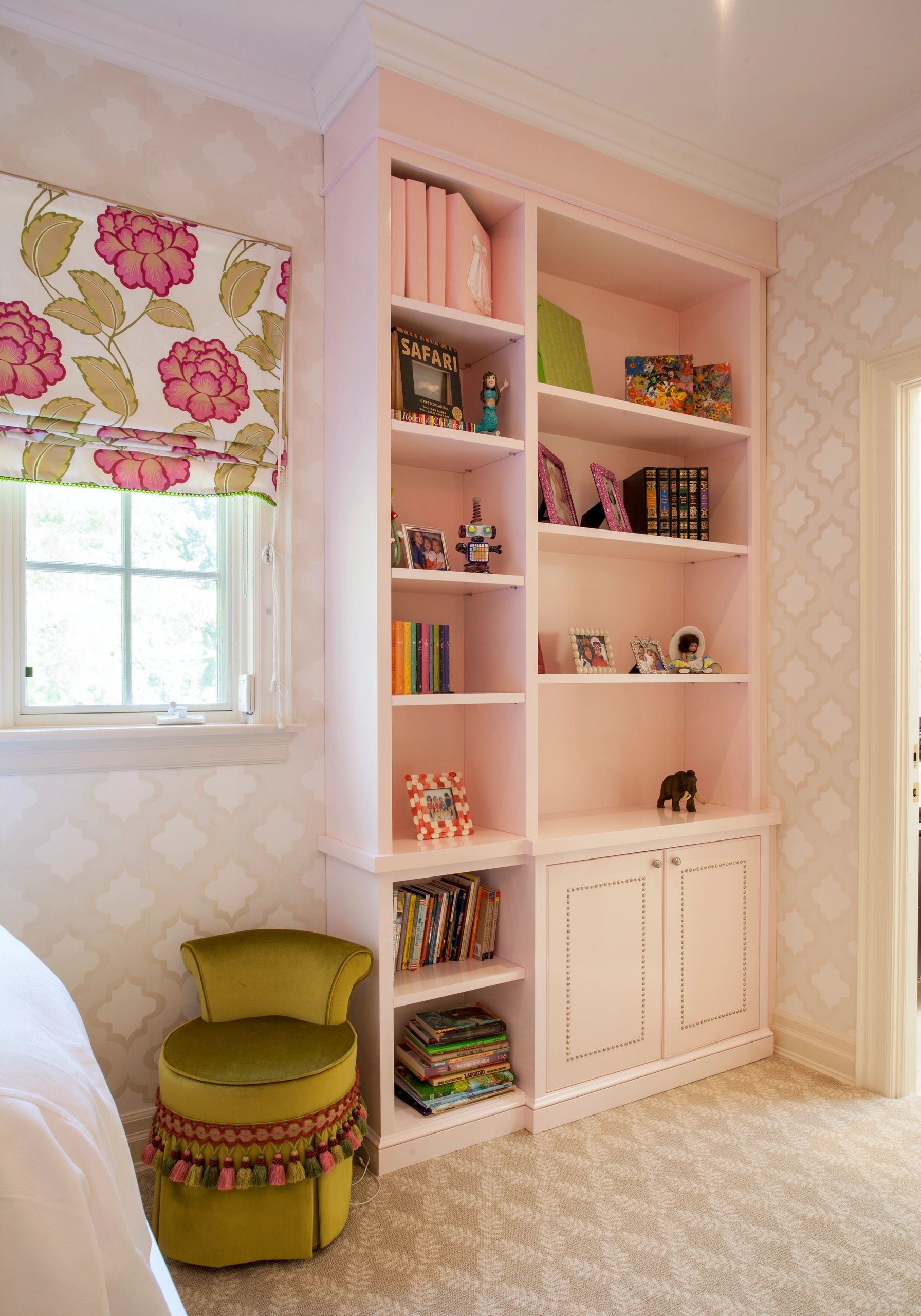 Girl's bedroom built-in shelving reading nook